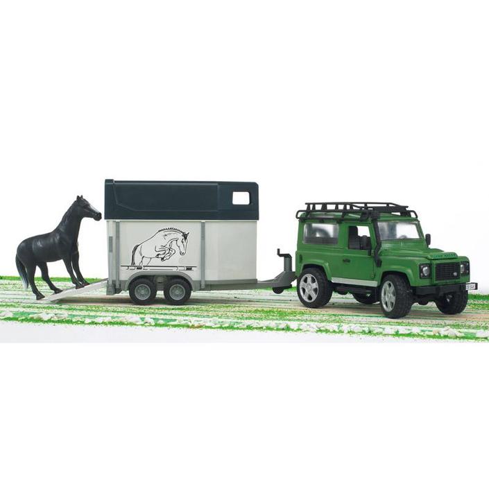 Bruder džip Land Rover s prikolicom i konjem