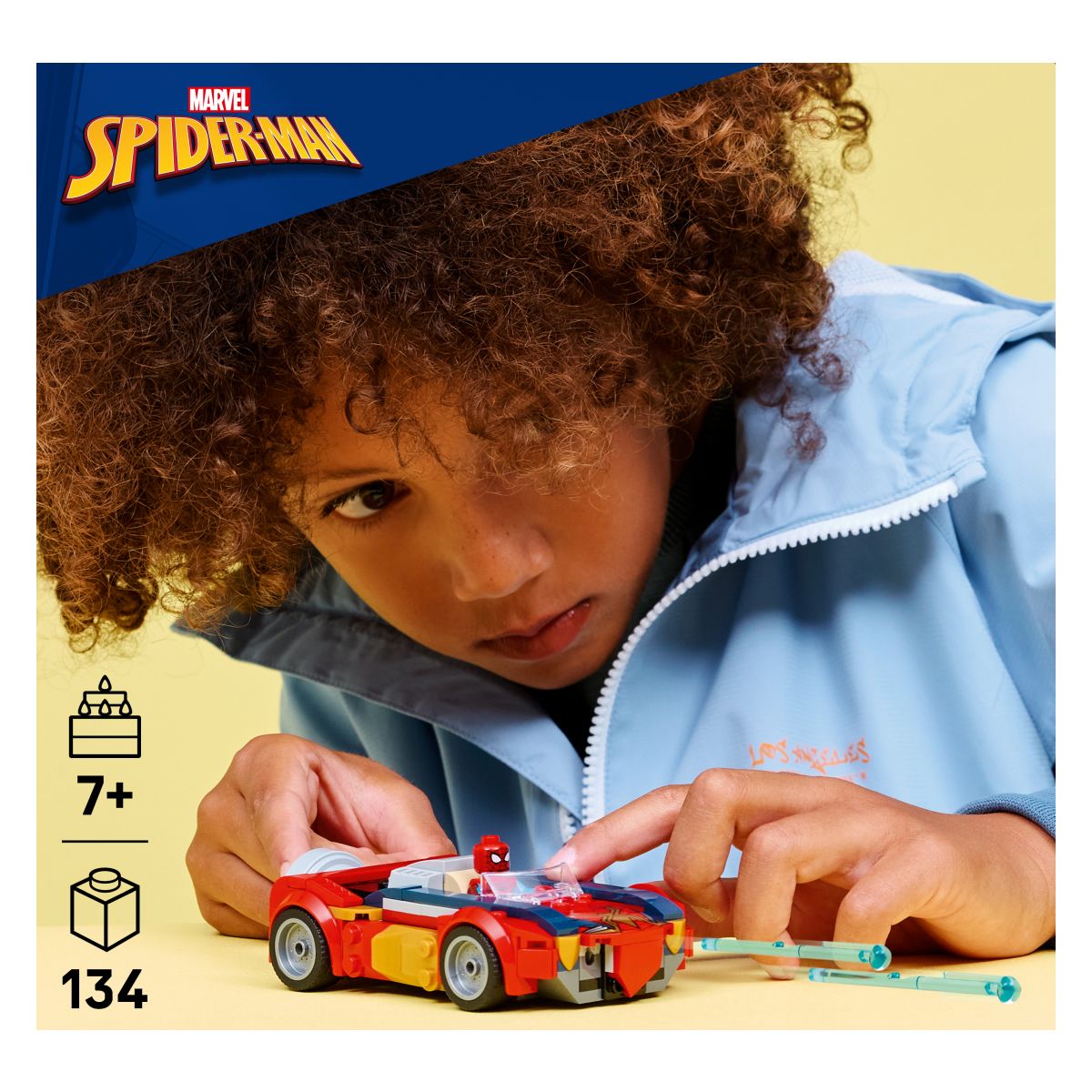 Kocke Super Heroes Spider-Man v avtomobilu proti venomiziranemu Wolverinu 76336