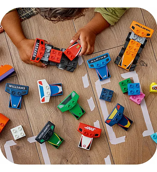 Kocke Duplo Dirkalniki in dirkalci ekipe F1® 10445 Lego